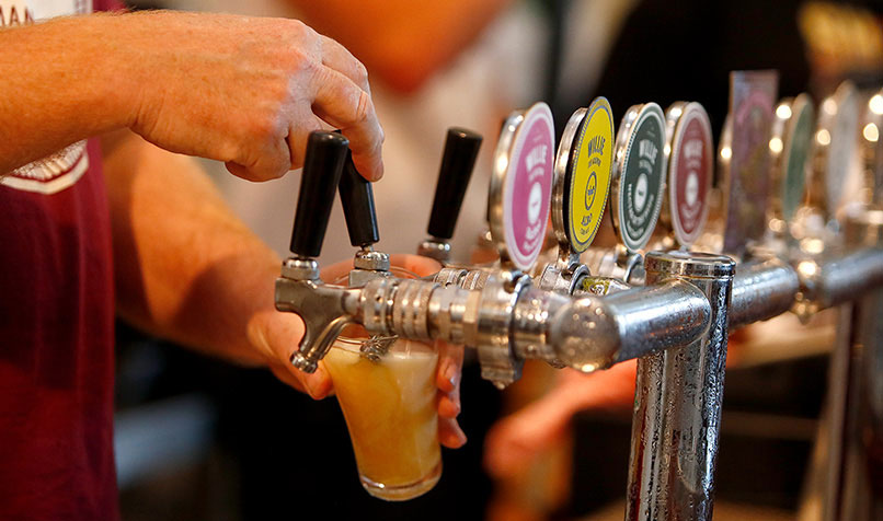 Australia’s growing craft beer movement will get a boost from a lower excise rate for smaller kegs. (AAP Image/Daniel Munoz)