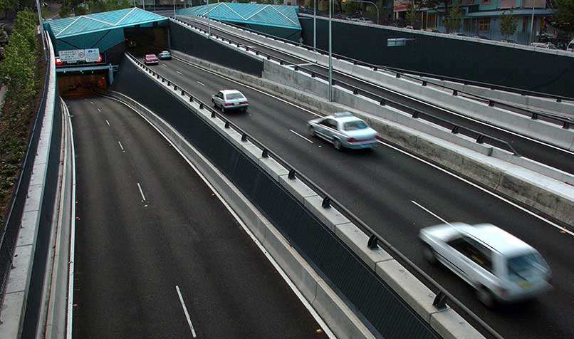 Cars bypass the entrance to Sydney's Cross City Tunnel in 2005.