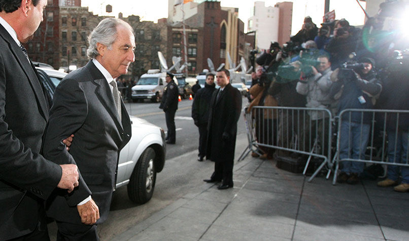 Bernie Madoff arrives at Federal Court in New York to face charges of fraud in 2009. His long-running commercial fraud spectacularly unravelled in 2008.