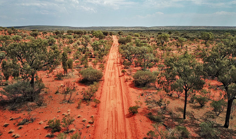 An outback road in Australia’s red centre, Northern Territory.