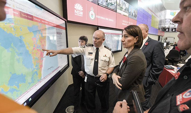 Fitzsimmons at the NSW RFS control room in late 2019, briefing New South Wales Premier Gladys Berejiklian on the bushfire crisis.
