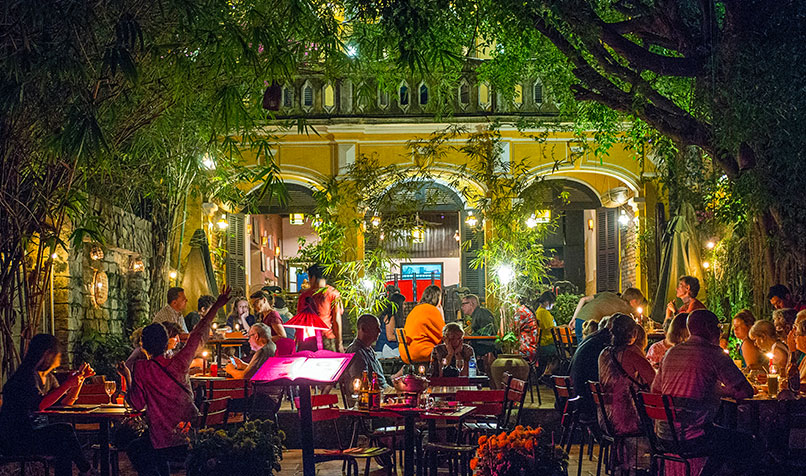 A busy restaurant housed in an old colonial mansion in Hoi An, a former trading port in Central Vietnam, which has World Heritage status for its old town.