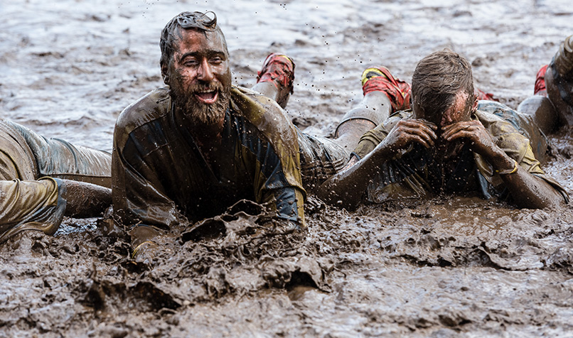 Playing in the mud: Undertaking a task for which you think you are overqualified and having to work with people further down the corporate ladder.